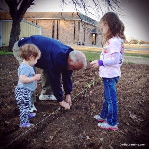children planting garden