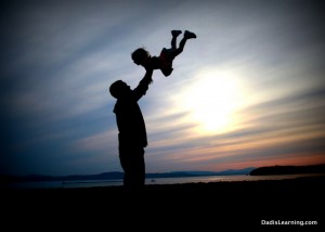 silhouette photo dad and child